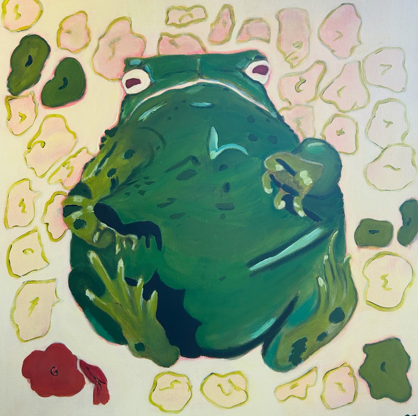 Colorful illustration of a giant monumental green toad surrounded by abstracted shapes and flowers set against a cream background.